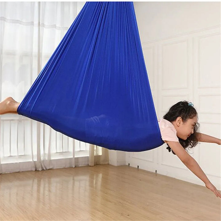 Hamac thérapeutique ZenSwing pour enfants avec besoins sensoriels, favorise la concentration et le calme.