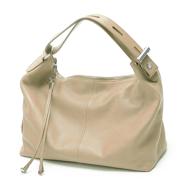 Élégant sac à main Aléria pour femme, en cuir fendu, tendance et pratique au quotidien.