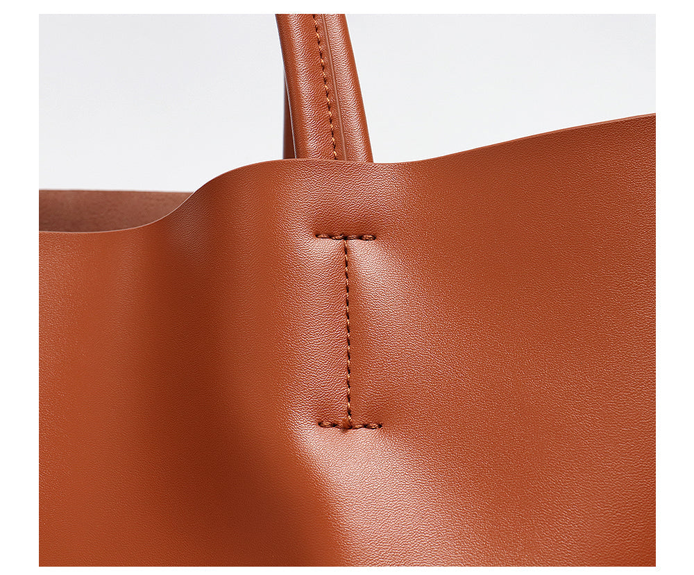 Sac à main cabas en cuir véritable, design intemporel pour femme moderne et stylée.
