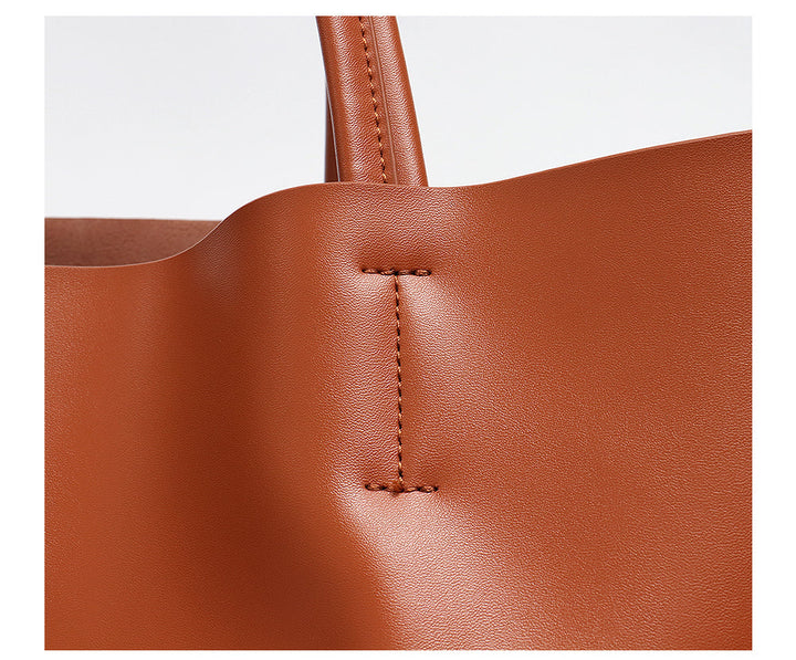 Sac à main cabas en cuir véritable, design intemporel pour femme moderne et stylée.