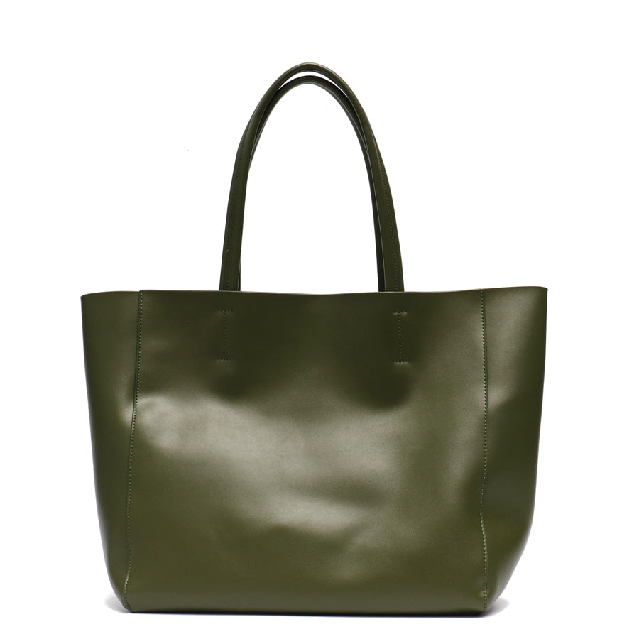 Sac cabas spacieux en cuir véritable, idéal pour le travail ou les sorties quotidiennes féminines.
