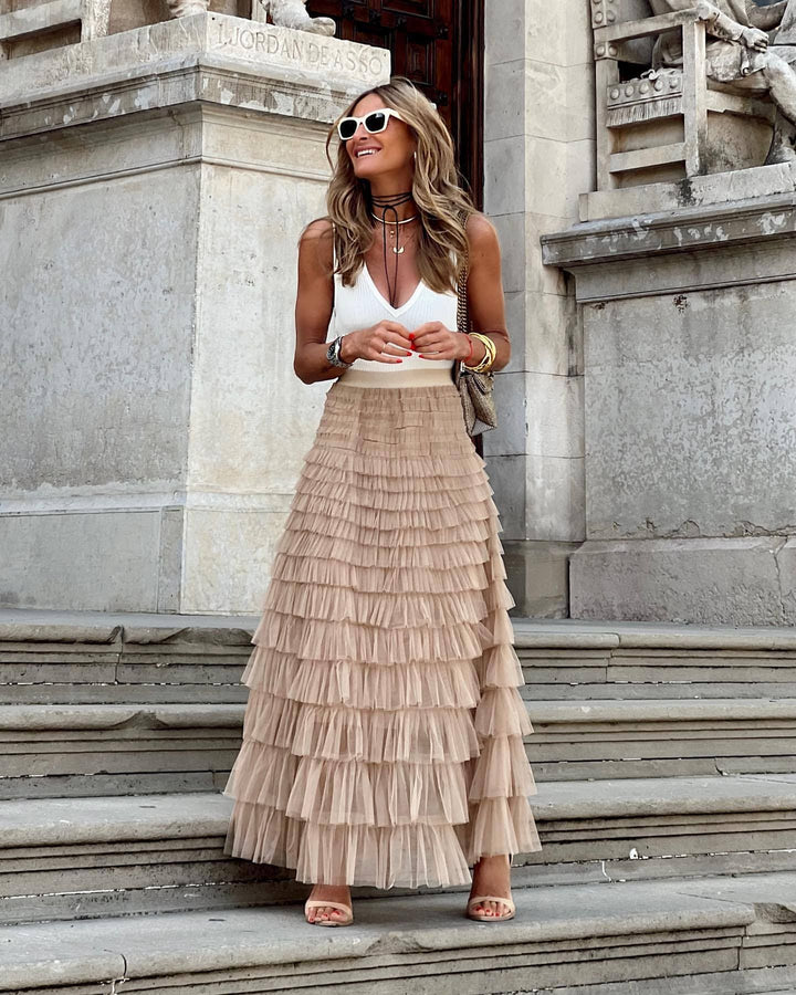 Jupe longue plissée femme, taille élastique, style chic et fluide, parfaite pour l'été.
