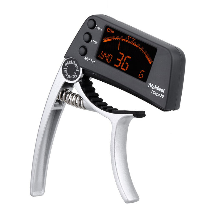 Accordeur basse et capo polyvalent TuneGrip, idéal pour la précision et le jeu sur scène.