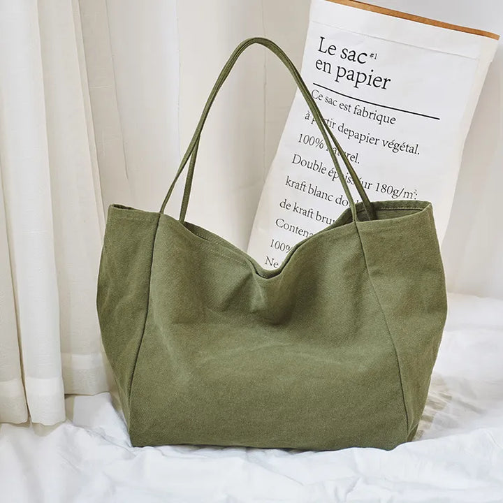 Sac shopping femme en tissu, grand et léger, idéal comme sac cabas pour les courses quotidiennes.