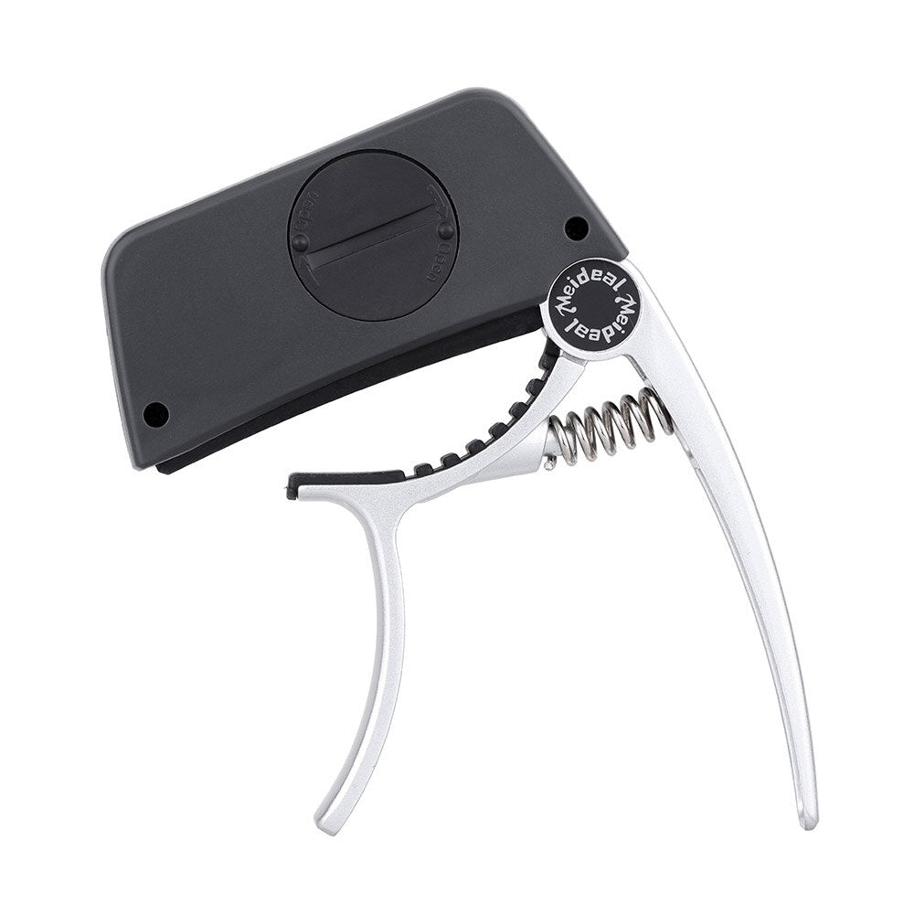 Accessoire 2-en-1: Capo guitare et accordeur chromatique précis pour tous instruments à cordes.