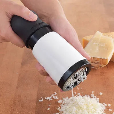 Râpe à fromage et épices DuoCut en acier inoxydable robuste pour cuisine moderne.