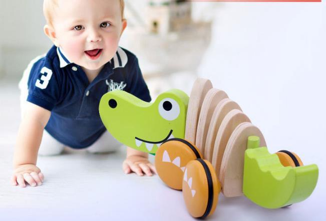 Chien et crocodile, jouets en bois à tirer pour enfants. Développe la motricité fine et l'équilibre.
