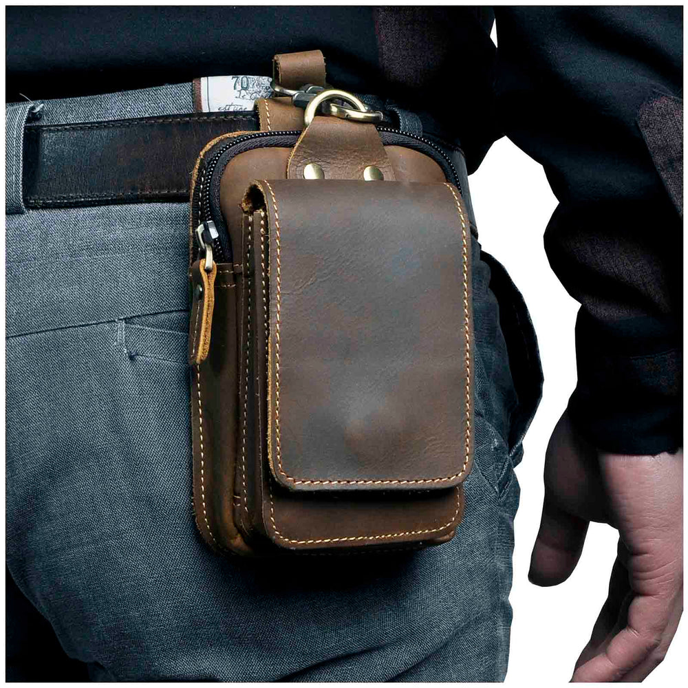 Sacoche ceinture homme en cuir noir, élégante, pour téléphone et petits objets essentiels.