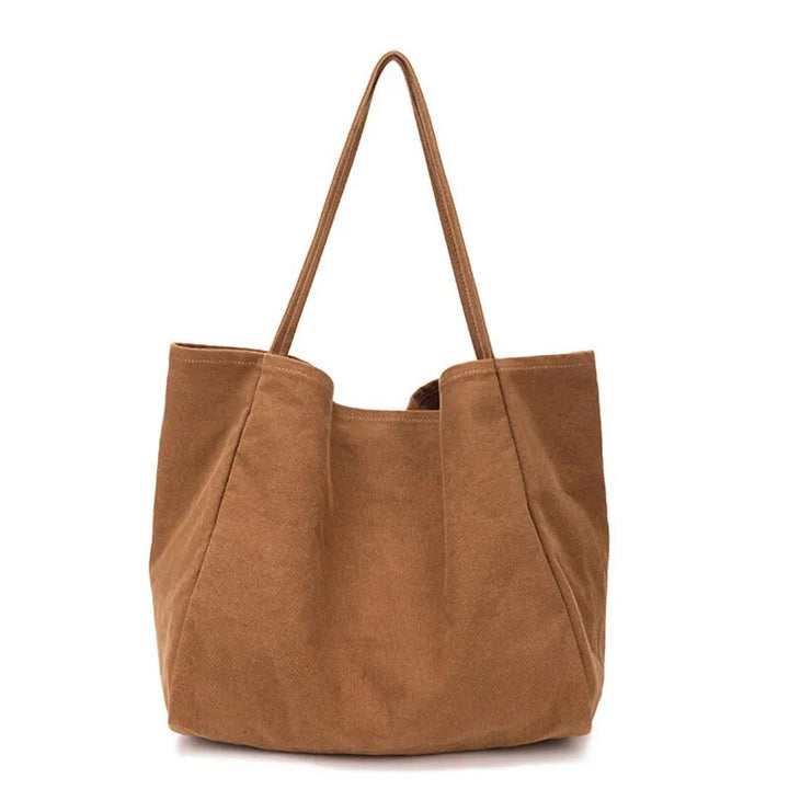 Élégant sac cabas fourre-tout en tissu résistant pour femme, un accessoire éco-responsable.