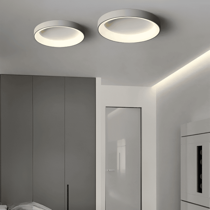Plafonnier LED rond minimaliste, éclairage moderne blanc chaud pour salon.