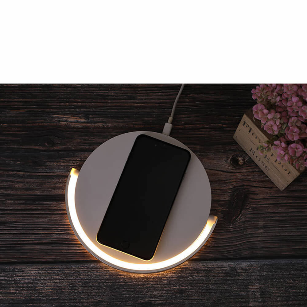 Chargeur sans fil rapide Qi AuraGlow, design moderne avec lampe LED intégrée pour iPhone, Apple Watch et AirPods.