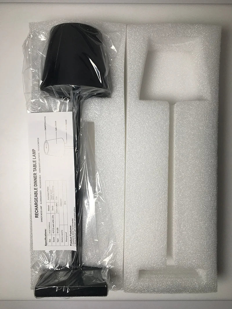 Éclairage d'ambiance LED, lampe de table sans fil et rechargeable, design minimaliste et fonctionnel.