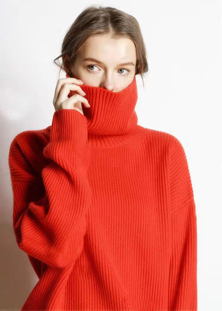 Pull élégant femme, col roulé ample, pour confort et chaleur hivernale.