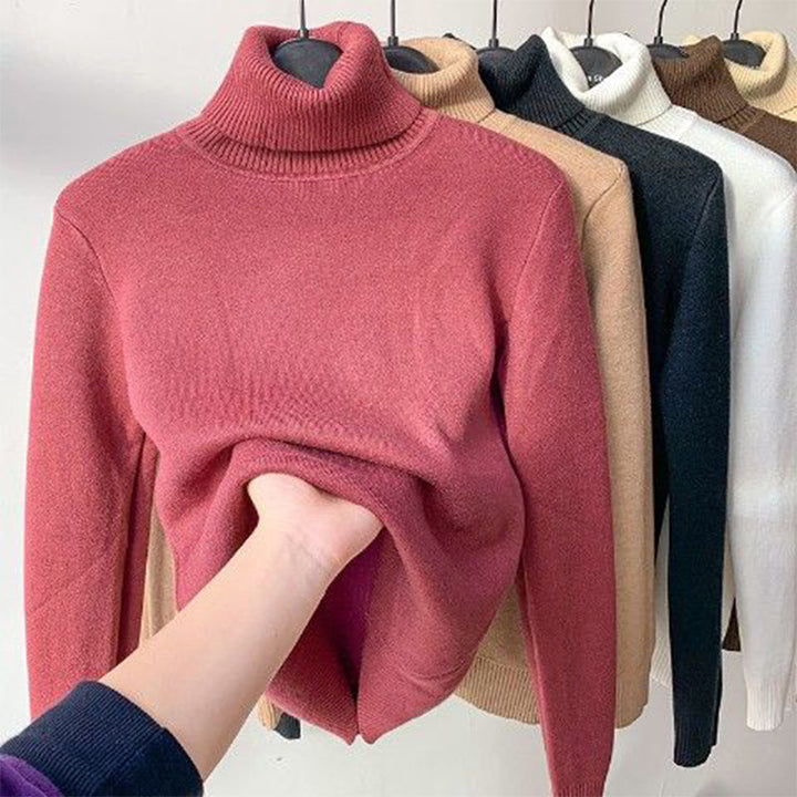 Détail du tricot de ce pull col roulé polaire femme, chaud et confortable, un essentiel élégant pour l'hiver.