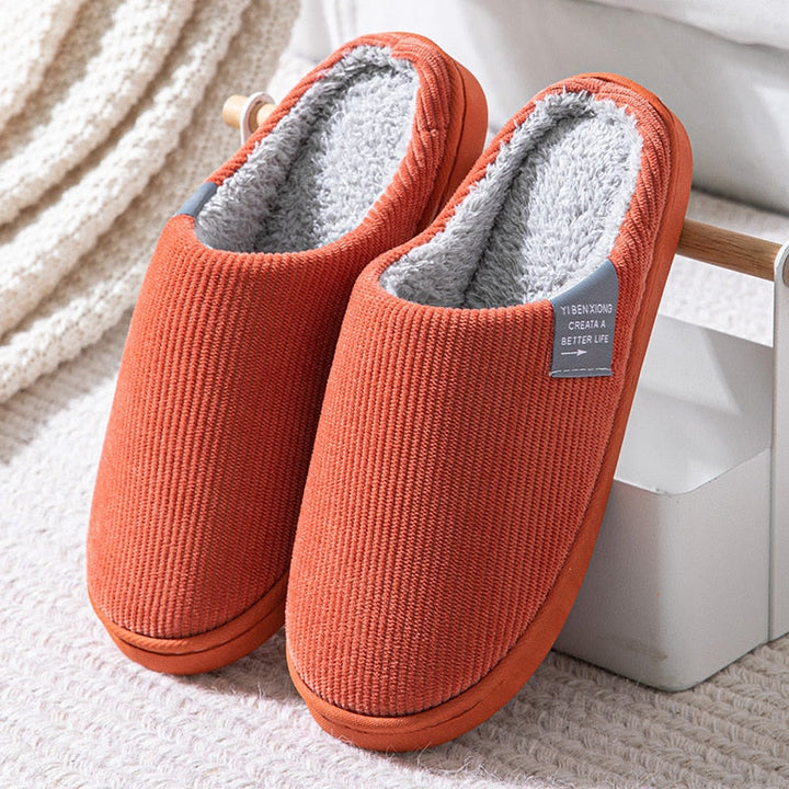 Chaussons en coton doux et moelleux, offrant une chaleur enveloppante pour les pieds en hiver.