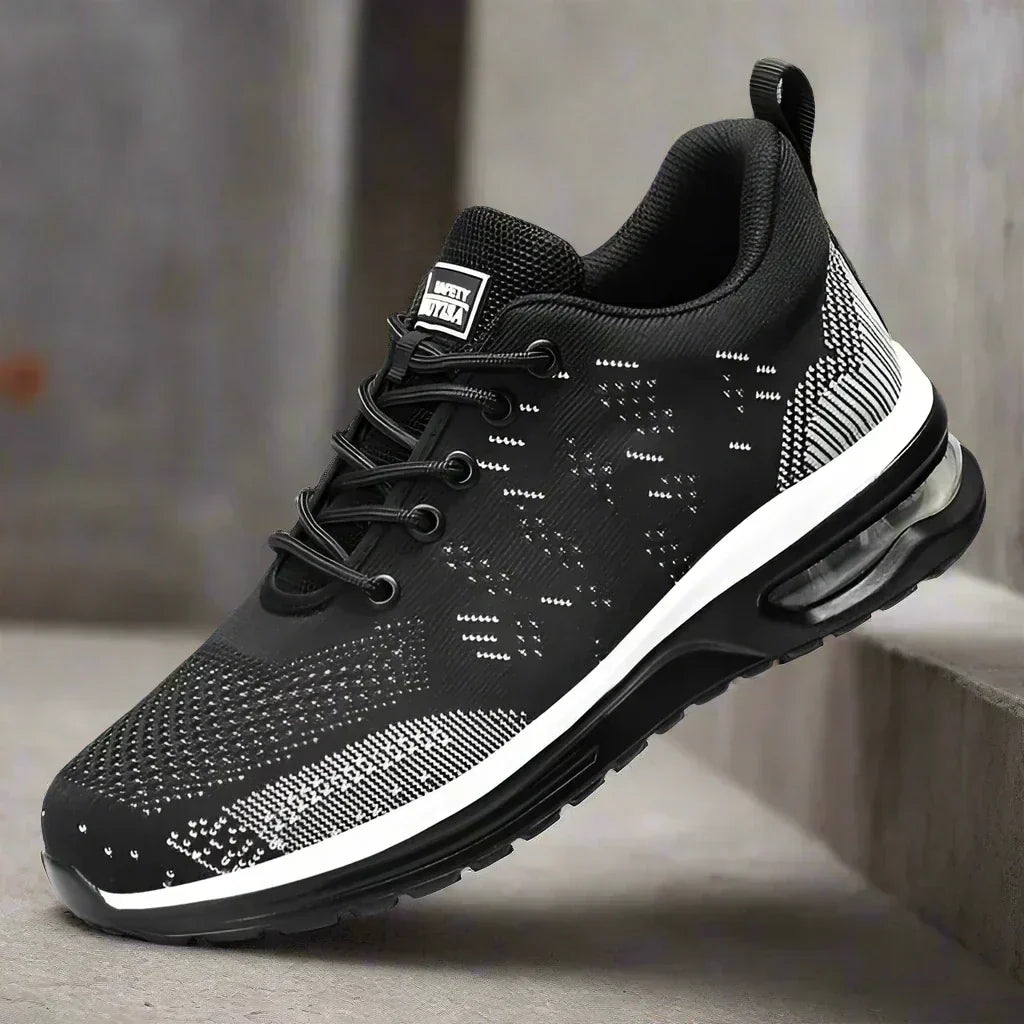Chaussures de sécurité orthopédiques unisexes noires avec embout acier. Idéales pour chantier et atelier, protection optimale.