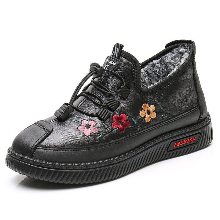 Chaussures de marche confortables et imperméables pour femmes, avec broderie florale élégante.