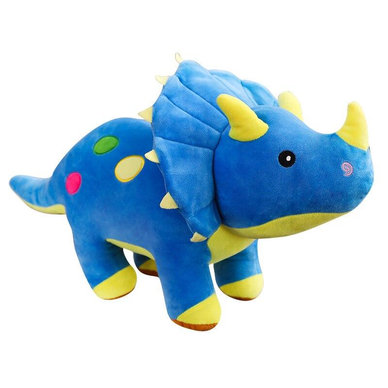 Énorme peluche tricératops rouge, doudou dinosaure sécurisant. Parfait cadeau enfant, doux et réconfortant.