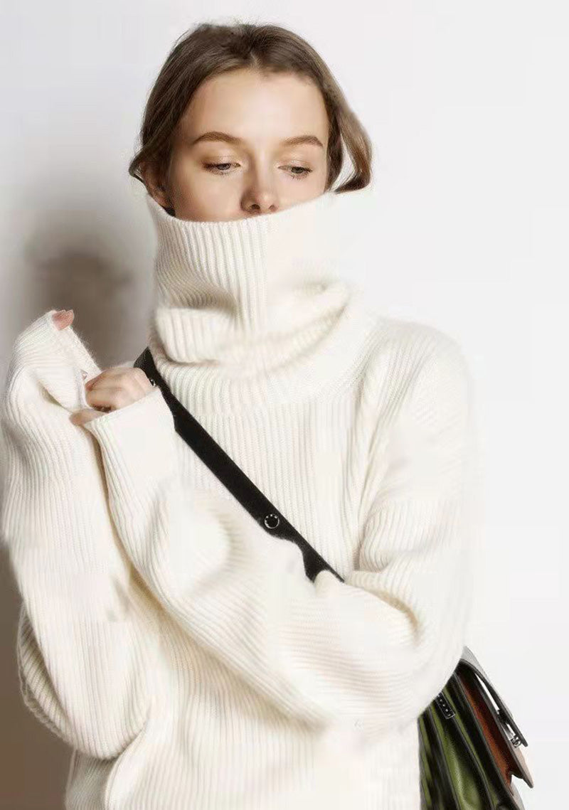 Pull hiver femme col roulé ample, élégant et décontracté.