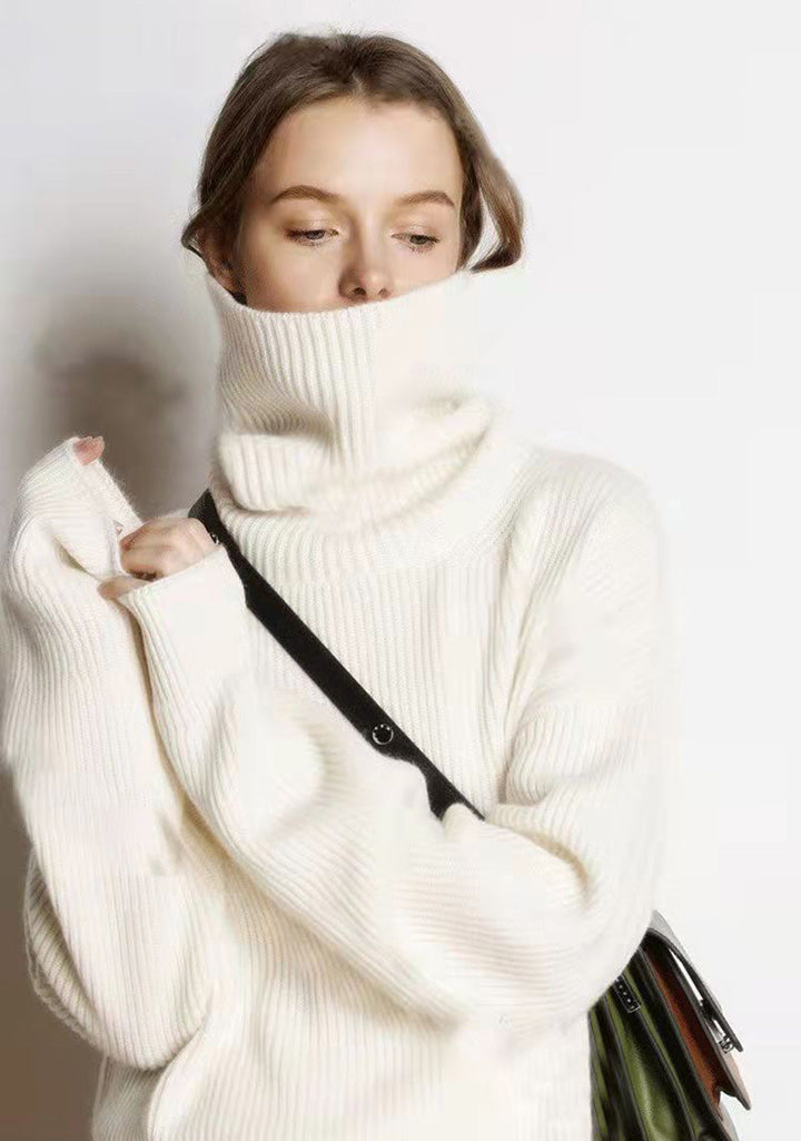 Pull hiver femme col roulé ample, élégant et décontracté.