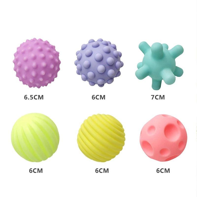Balles sensorielles en caoutchouc naturel pour bébé, stimulent l'exploration tactile et le développement enfant.