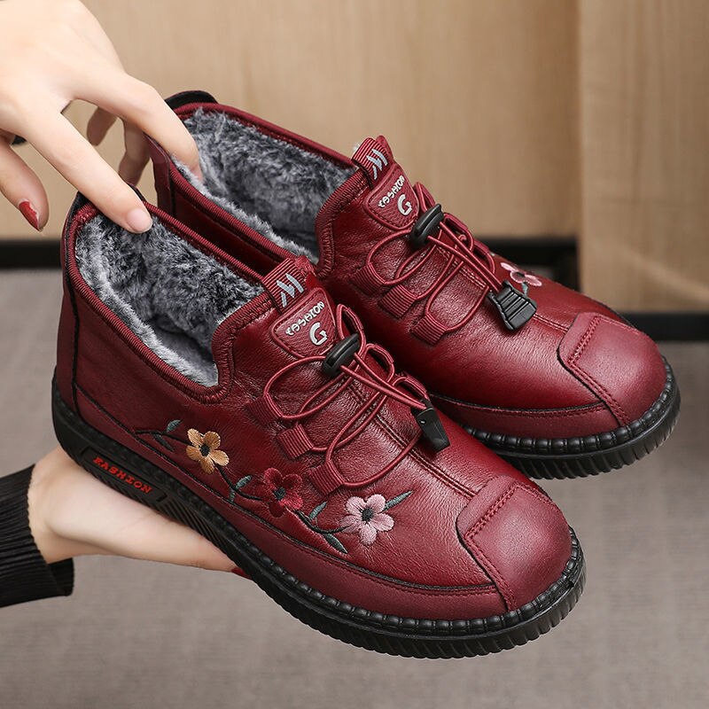 Vue latérale: chaussures de marche élégantes et confortables pour femmes, broderie florale, semelle robuste.
