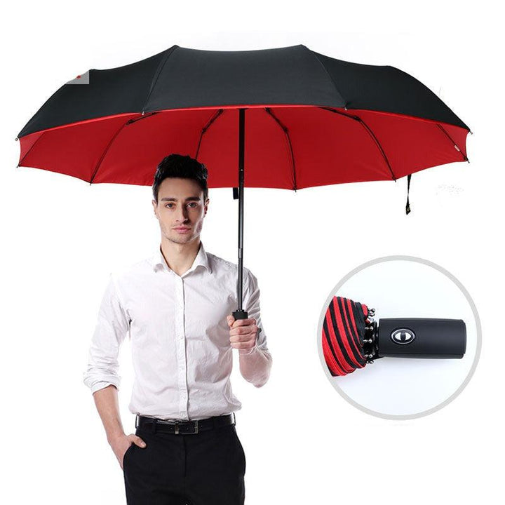 Parapluie tempête pliable ultra résistant au vent, parfait pour hommes et femmes en extérieur.