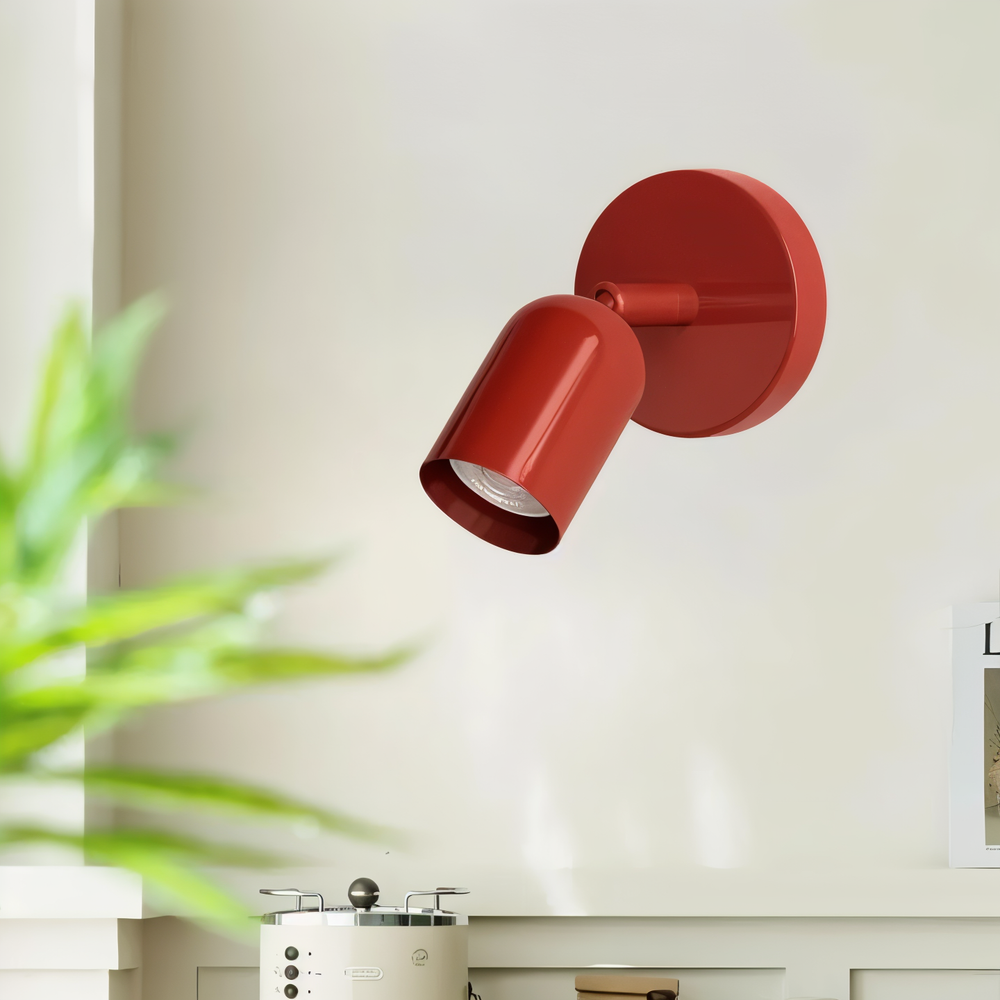 Lampe murale LED ronde style macaron, couleur vibrante, éclairage moderne pour salon ou chambre.