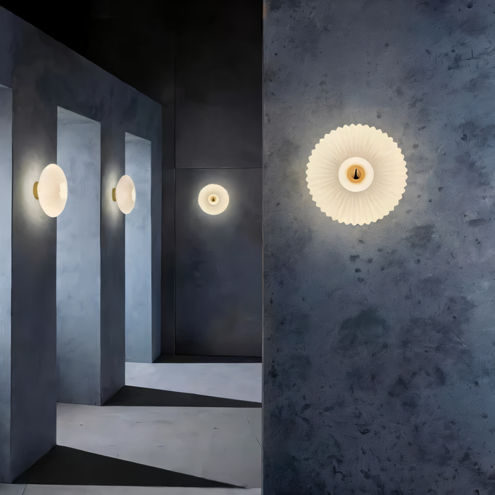 Applique murale LED ronde avec lumière ondulée. Parfait pour créer une ambiance chaleureuse et moderne.