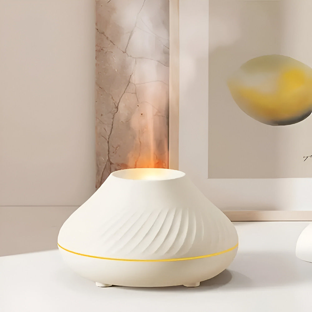 Élégant diffuseur d'arômes & humidificateur pour le bureau, favorise la concentration et la détente.