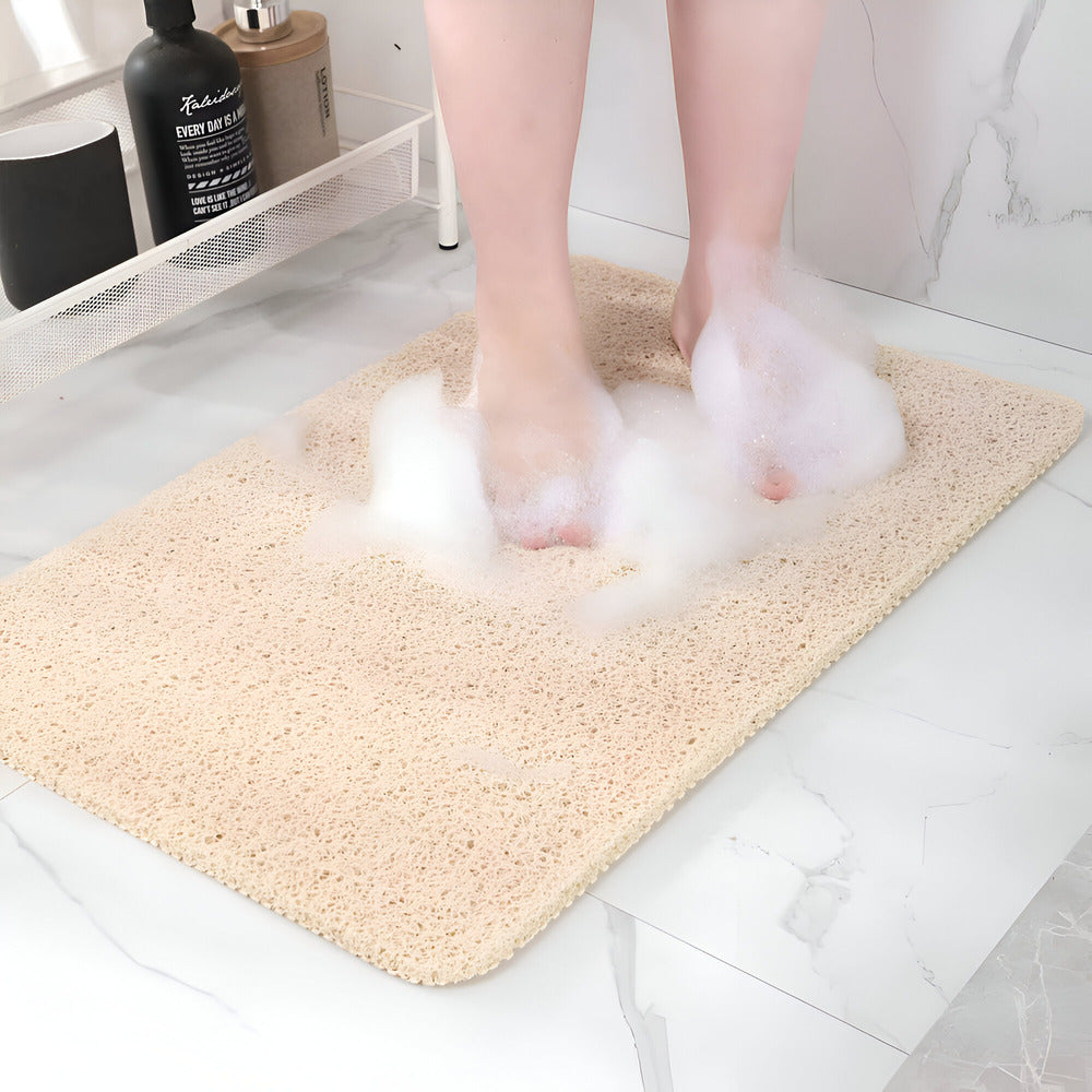 Tapis de douche texturé antidérapant, séchage rapide. Assure confort et sécurité du sol en salle de bain. Anti-moisissure.