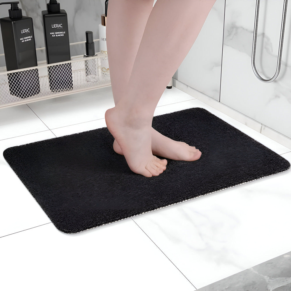 Design et fonctionnel: tapis de douche antidérapant, offrant confort et sécurité. Parfait accessoire pour salle de bain.