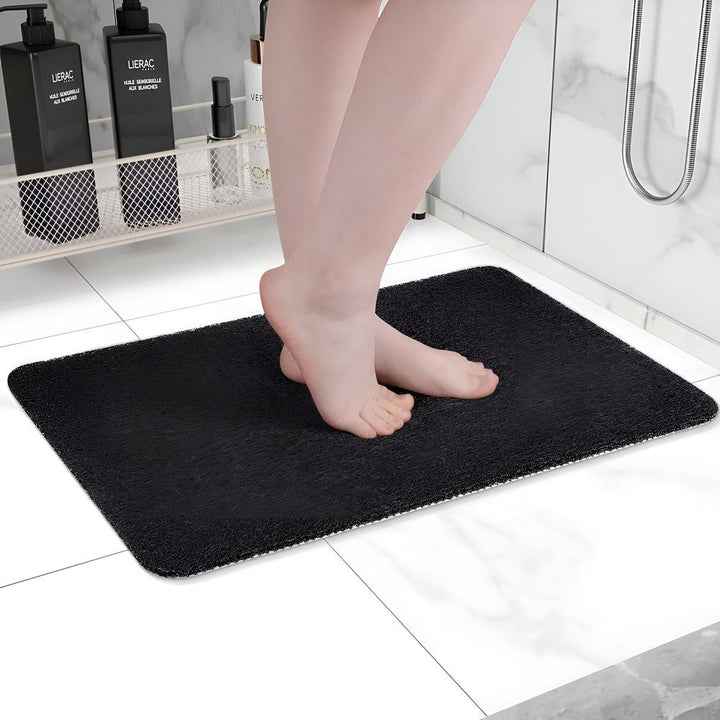 Design et fonctionnel: tapis de douche antidérapant, offrant confort et sécurité. Parfait accessoire pour salle de bain.
