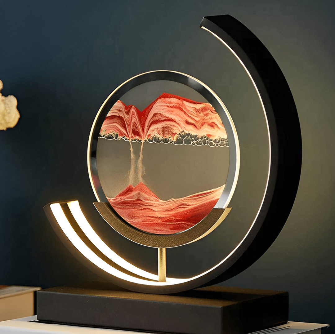 Lampe de relaxation LumaSand LED dimmable avec sable mouvant, télécommande et app pour ambiance zen.