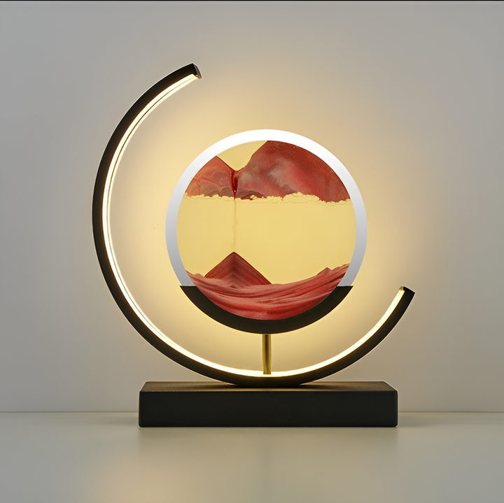 Lampe de méditation LumaSand avec art du sable mouvant LED. Crée une ambiance apaisante, dimmable.