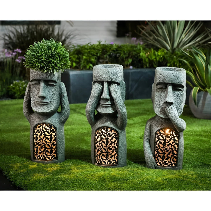 Statue Moai solaire LuxeLumen pour jardin, éclairage LED doux, résine résistante aux intempéries, ambiance zen.
