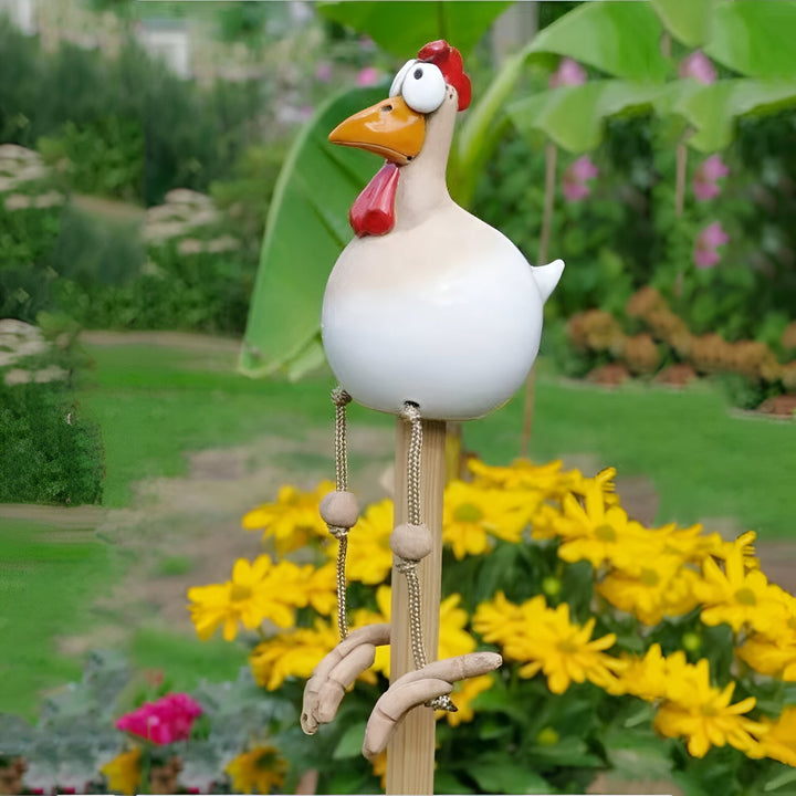 Coq de jardin rigolo en résine, pattes balantes, décorez votre terrasse avec fantaisie.
