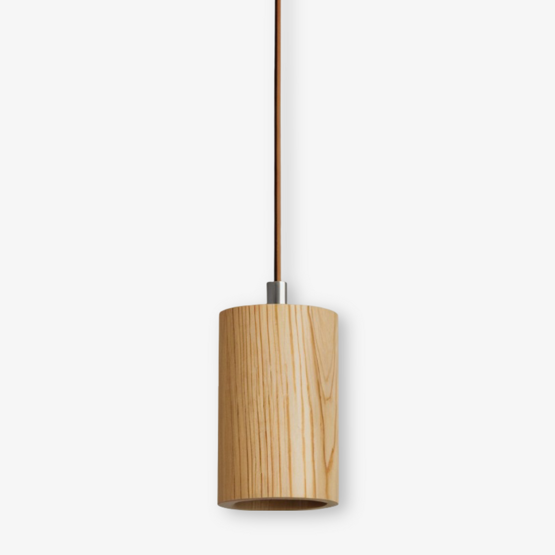 Suspension cylindrique noire élégante pour éclairage salon moderne. Luminaire design intérieur scandinave.