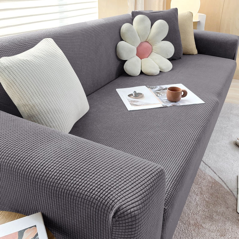 Textile maison: housse canapé lavable machine, élastique, pour un salon toujours impeccable.