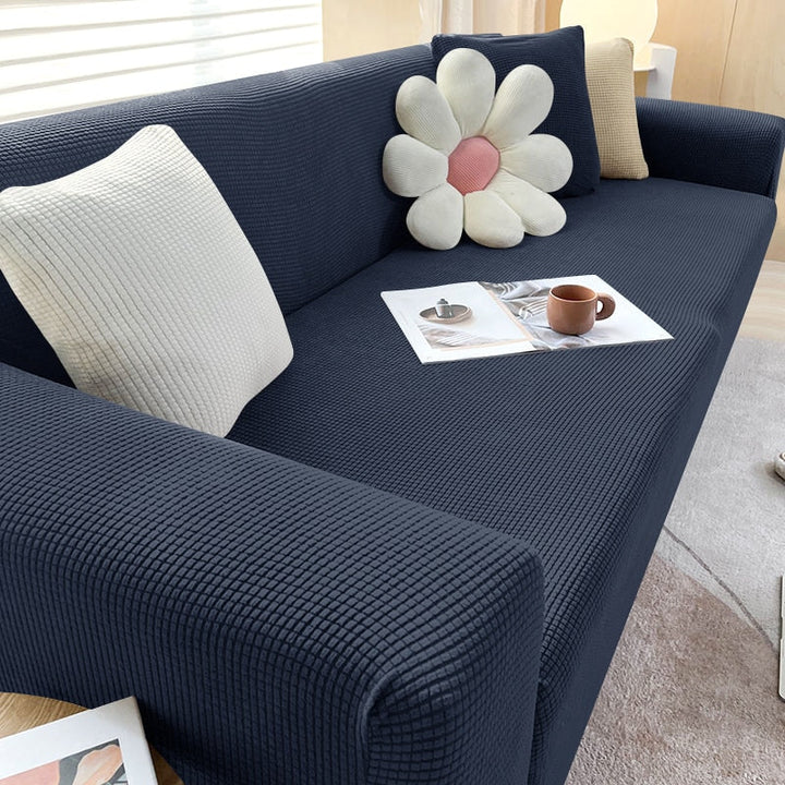 Rénovation meuble facile: housse canapé jacquard extensible, protection et décoration salon.