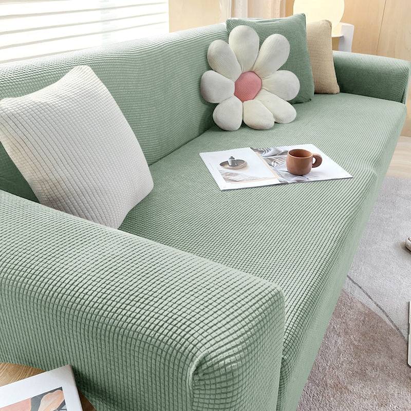 Textile maison: housse canapé extensible élégante, lavable, anti-taches, idéale pet friendly.
