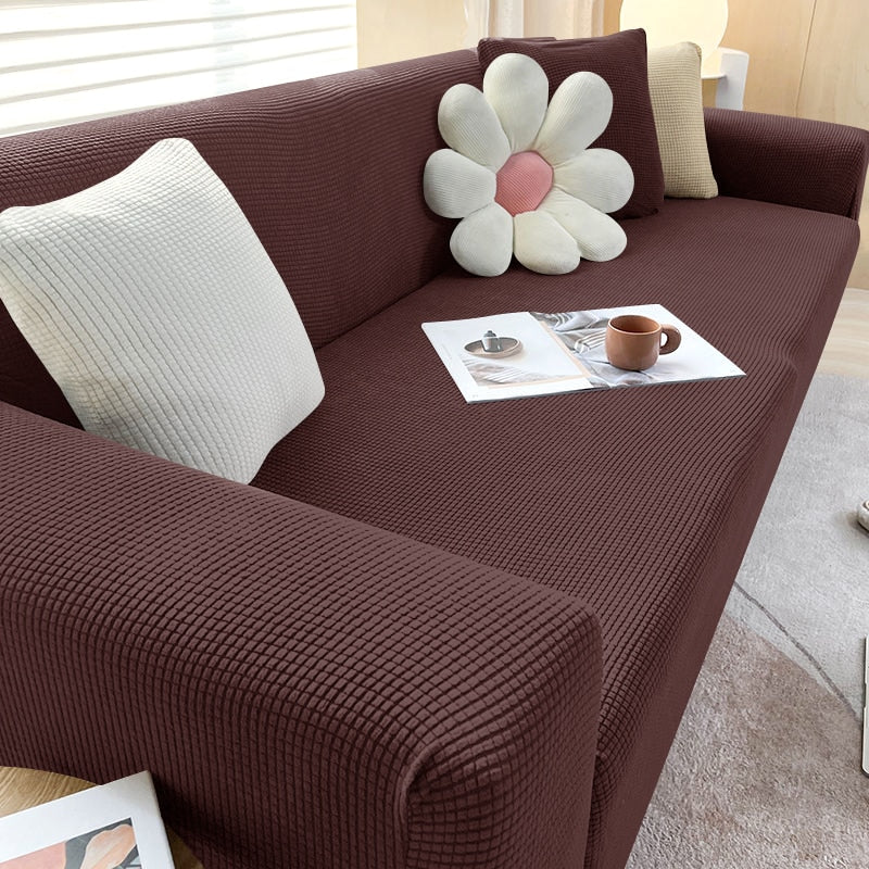 Protection canapé extensible lavable machine, housse anti-taches pet friendly pour meuble durable.