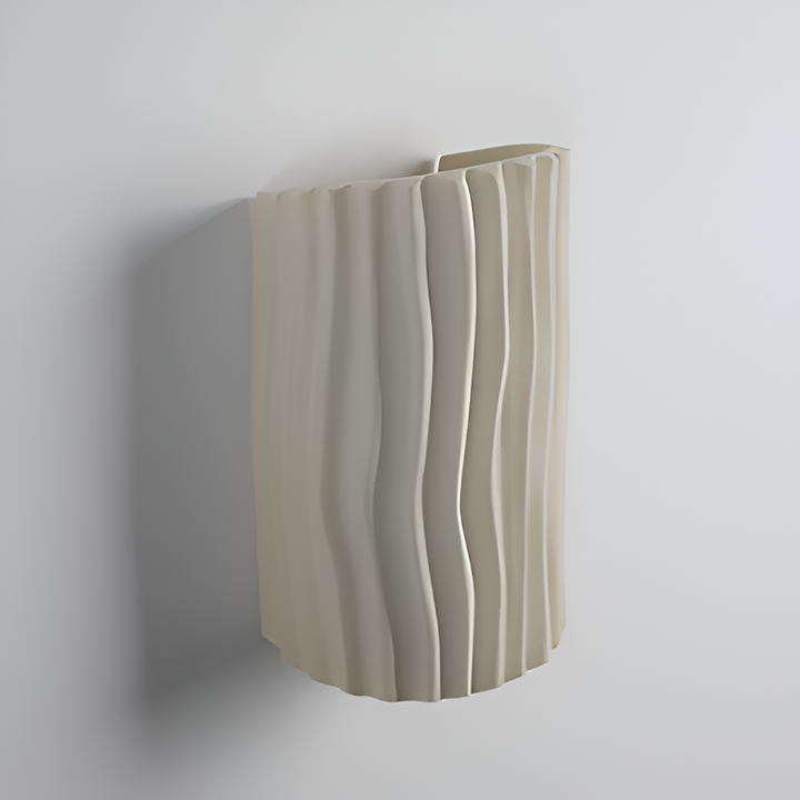 Design plissé Veloura, lumière LED douce: cette applique murale moderne sublime votre chambre.