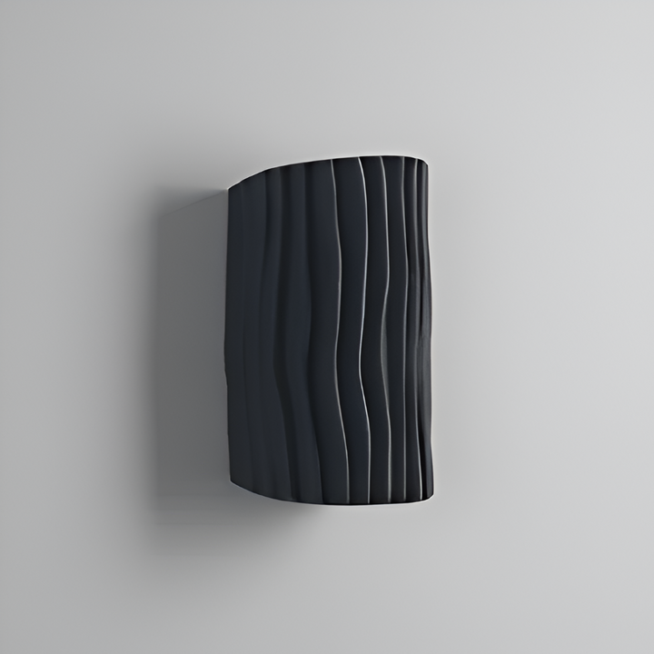 Applique murale LED Veloura, éclairage moderne pour une décoration intérieure avec touche plissée.