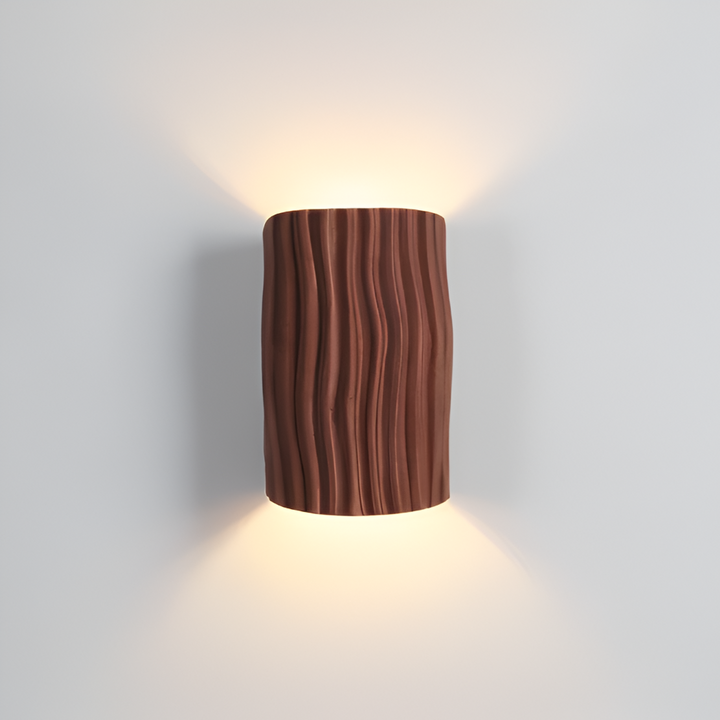 Éclairage moderne LED Veloura, design plissé pour une applique murale chaleureuse et élégante.