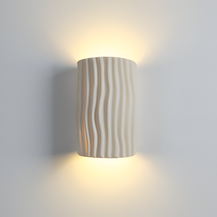 Éclairage d'appoint LED Veloura, applique murale plissée pour une décoration intérieure stylée.
