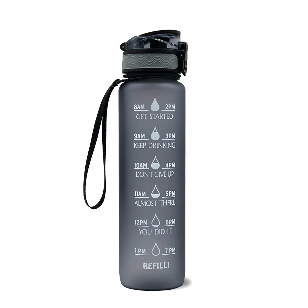 Bouteille d'eau réutilisable 1 litre, sans BPA. Motivation quotidienne pour une hydratation optimale. Sport/bureau.