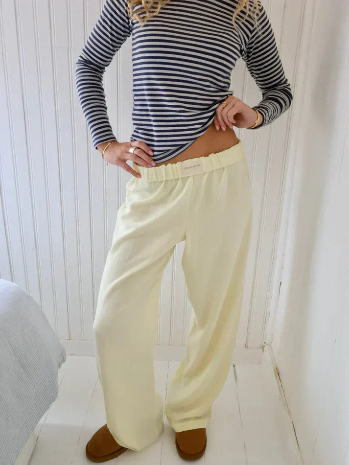 Pantalon fluide à rayures pour femme, coton, chic et confortable, mode quotidienne.