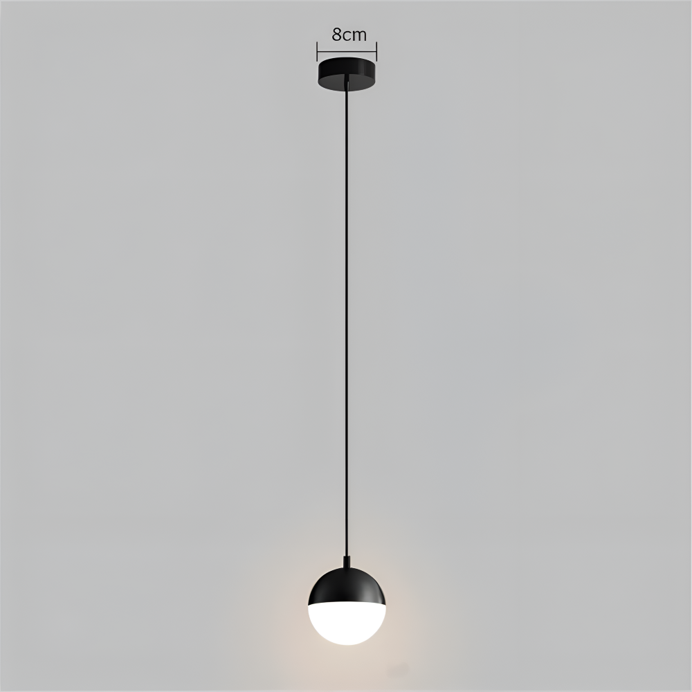 Suspension design moderne or et noir, boule de cristal, éclairage LED, idéal pour un décor contemporain.
