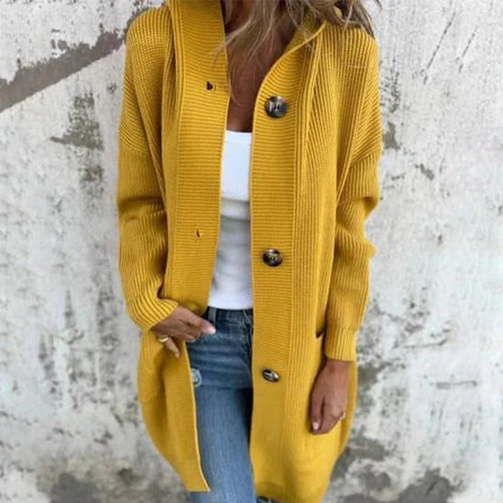 Élégant gilet long femme pour l'hiver, coupe chaude et confortable. Cardigan chic et polyvalent, essentiel mode féminine.